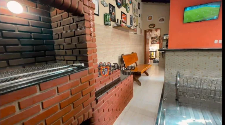 Imagem Sobrado com 4 dormitórios à venda, 246 m² por R$ 1.000.000,00 - Jardim Aruan - Caraguatatuba/SP