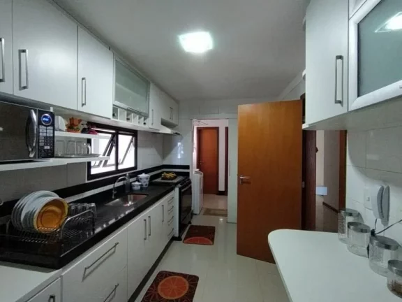 Imagem Excelente Apartamento de Frente para o Mar na Praia do Morro composto por 4 dormitório sendo 3 suítes, com 2 vagas de garagem.