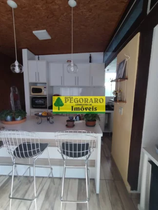 Imagem Casa à venda em Caraguatatuba-SP: 3 quartos, suíte, sala com vista para o mar e deck com hidro!