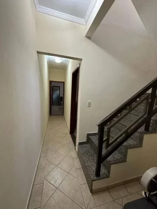 Imagem Sobrado com 3 dormitórios à venda, 147 m² por R$ 650.000 - Tupi - Praia Grande/SP