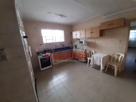 Imagem Casa com 3 dormitórios e 2 vagas à venda no Macuco em Santos R$ 900.000,00