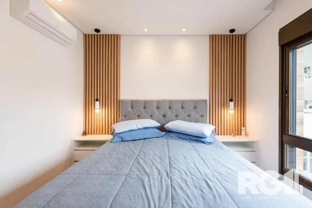 Imagem Apartamento de 3 dormitórios com suíte e churrasqueira, lavabo e 2 vagas de garagem.