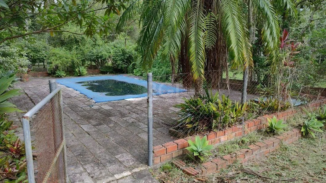 Imagem Sito à venda no Lami, com casa com quartos, 1 banheiro e piscina