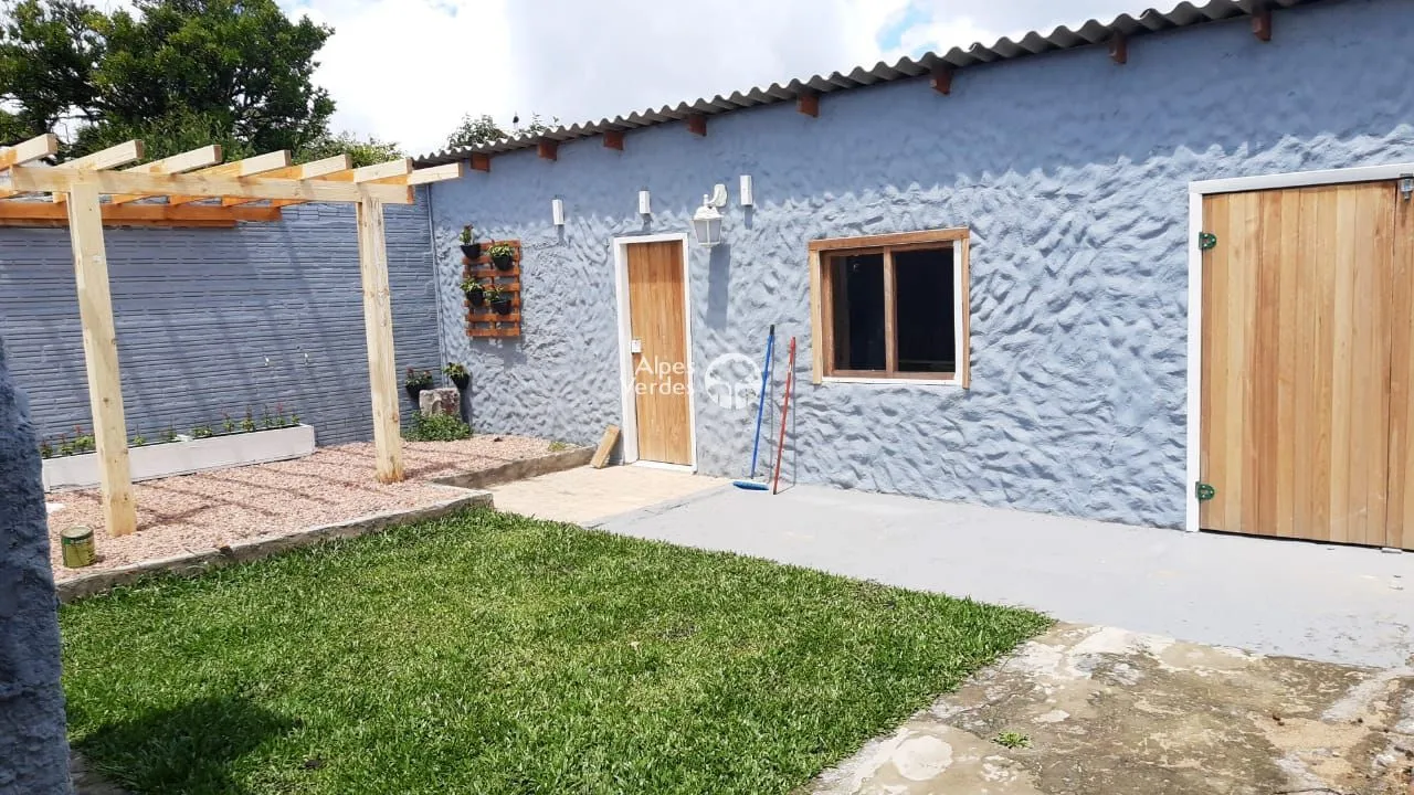 Imagem Casa com 2 dormitórios à venda por R$ 680.000 - Centro - Canela/RS
