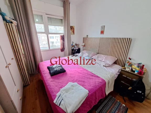 Imagem Apartamento à venda com 94m², 2 quartos, dependência, varanda de frente por R$580.000,00 no Gonzaga em Santos