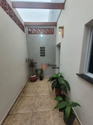Imagem Sobrado com 2 suítes à venda, 100 m² por R$ 530.000 - Praia das Palmeiras - Caraguatatuba/SP