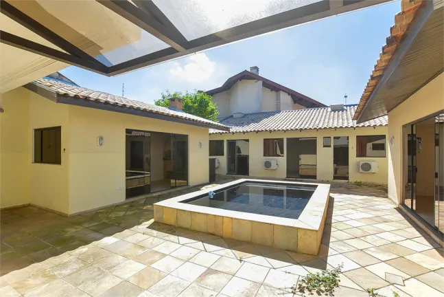 Imagem Casa com 3 Quartos à Venda, 271 m² em Jardim das Américas - Curitiba