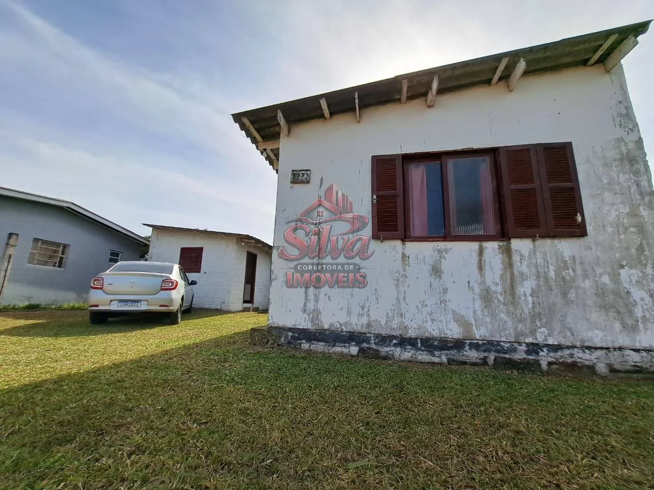 Imagem Terreno com 3 casas em Mariluz