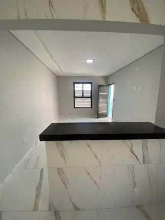 Imagem Casa com 2 dormitórios à venda, 88 m² por R$ 620.000,00 - Aviação - Praia Grande/SP