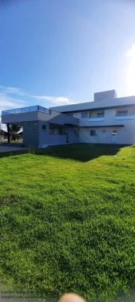 Imagem Casa de luxo em condomínio à venda em Busca Vida, Camaçari-BA: 4 quartos, 4 suítes, 2 salas, 2 banheiros, 4 vagas, 400m².