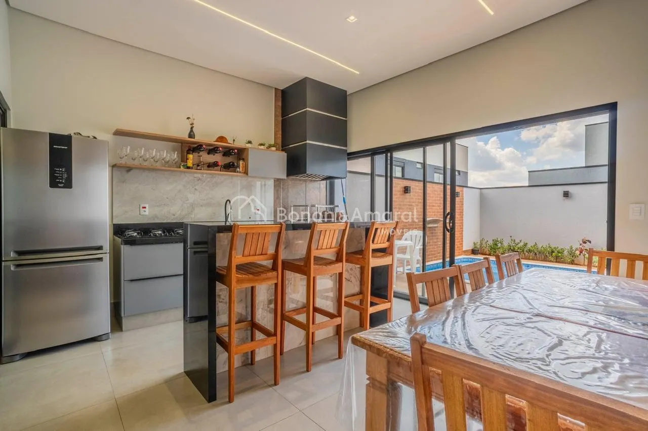 Imagem Casa à venda em condomínio, em Paulínia, 3 suites, closet, lavabo, escritório, 4 vagas, aquecimento solar, piscina com cascata,fino acabamento.