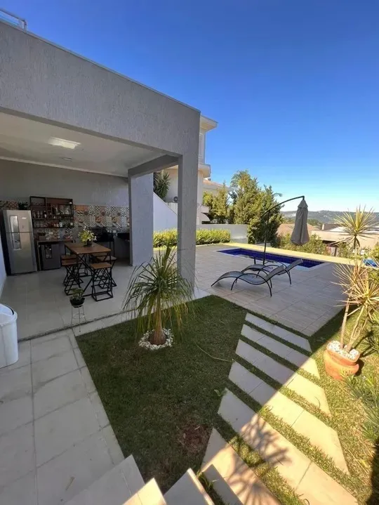 Imagem Casa de Alto Padrão no Condomínio Valville - 3 Suítes, Vista Panorâmica e Lazer Completo!