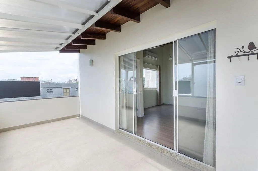 Imagem Cobertura semi mobiliada com 2 dormitórios, terraço com churrasqueira e 1 vaga de garagem no bairro Santo Antonio