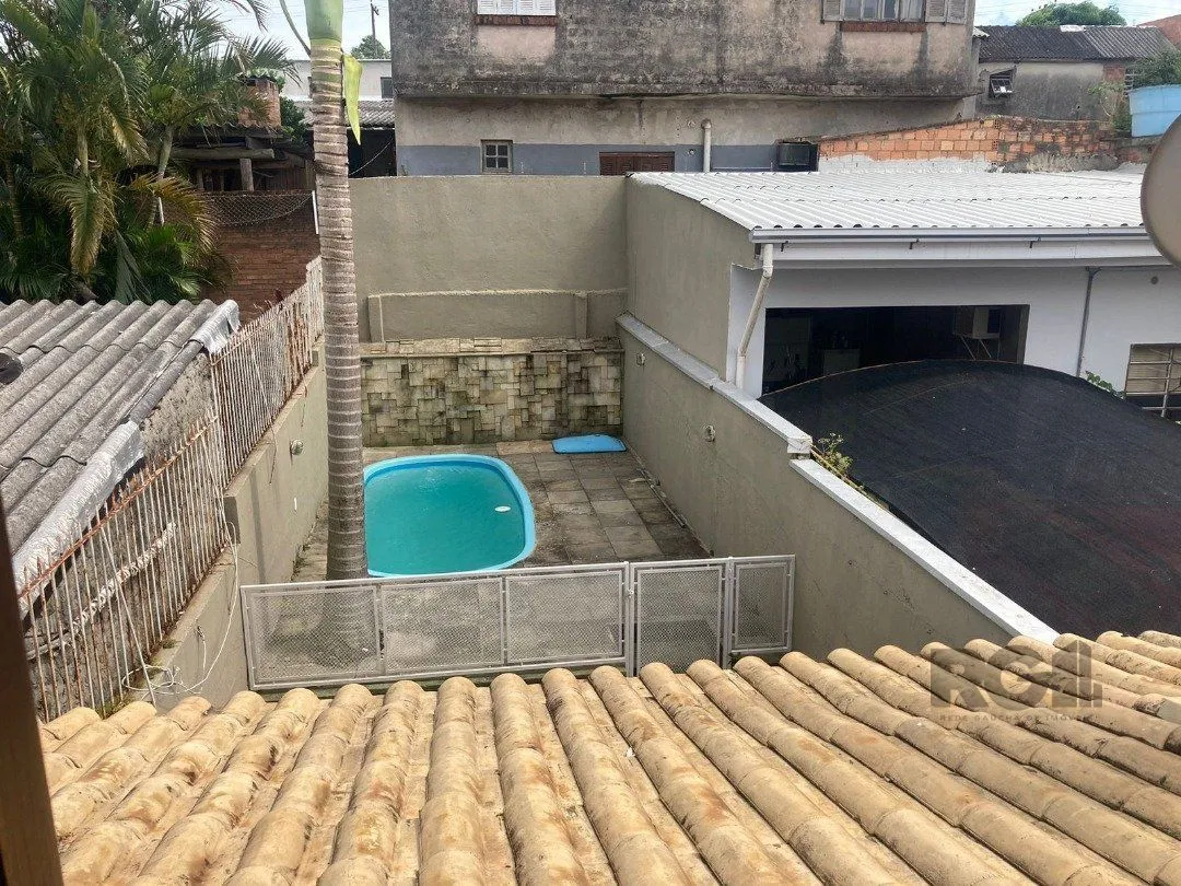 Imagem CASA | 2 DORMITÓRIOS | 1 SUÍTE | 2 VAGAS | PISCINA | SACADA | BAIRRO HÍPICA | ZONA SUL