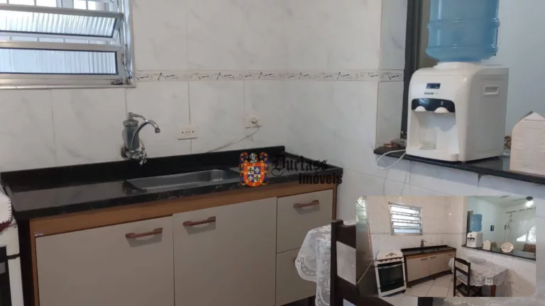 Imagem Casa com 2 dormitórios à venda, 64 m² por R$ 390.000 - Vila Caiçara - Praia Grande/SP