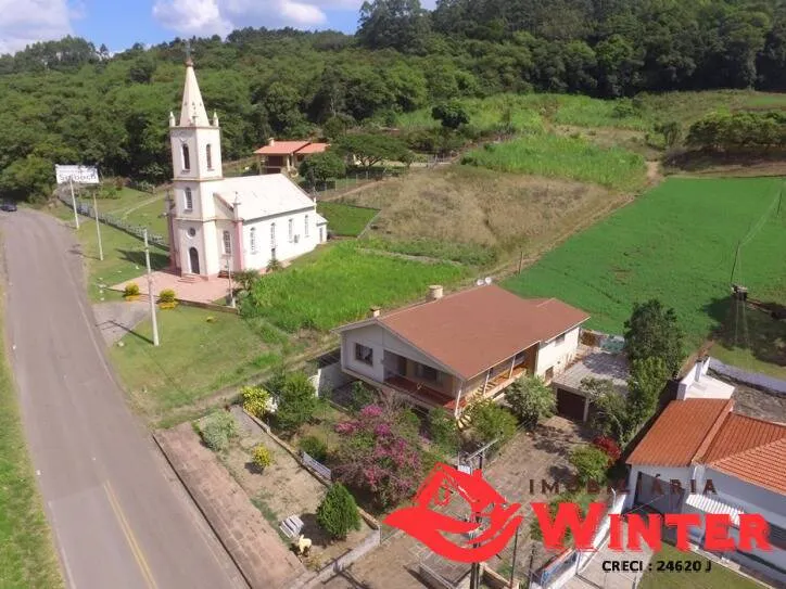 Imagem Casa de 4 dorm com 2 box ao lado da igreja de Arroio Feliz.