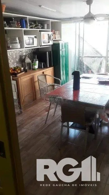 Imagem Casa residencial com 3 dormitórios 90m² privativos, e 2 vagas à venda no bairro Parque Santa Fé em Porto Alegre