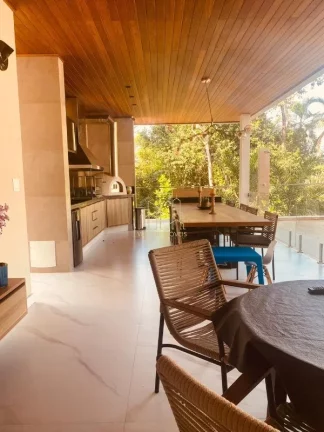 Imagem Casa Alto Padrão à Venda em Alphaville Salvador I | 5 Suítes | Porteira Fechada | Área Gourmet | Piscina