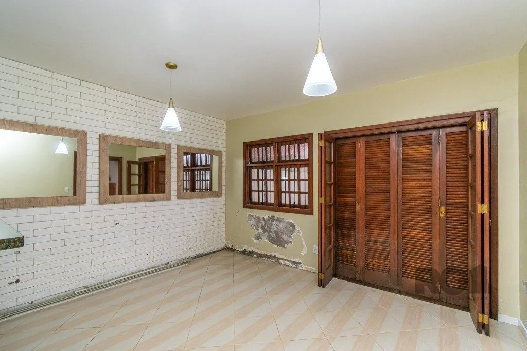 Imagem Casa Condominio no bairro Guarujá de 3 dormitórios 1 vaga