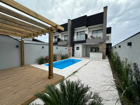 Imagem SOBRADO COM PISCINA, 3 QUARTOS SENDO 1 SUÍTE COM CLOSET, ITAPEMA DO NORTE