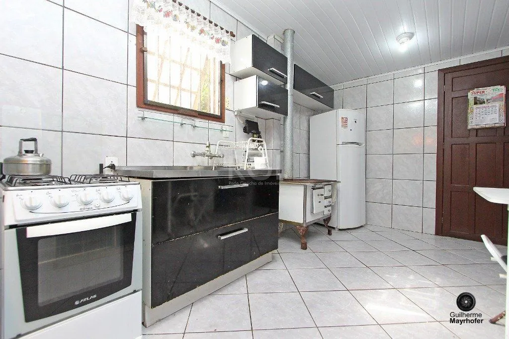 Imagem Casa para Venda - 150m², 2 dormitórios, 2 vagas - Nonoai