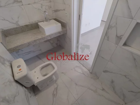 Imagem Sobreposta baixa com 3 suítes lavabo piscina 2 vagas de garagem na Ponta da Praia em Santos (SP) por R$.1.100.000,00