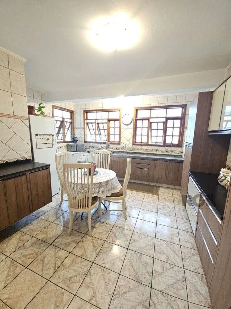 Imagem casa de 5 dormitórios no bairro Glória