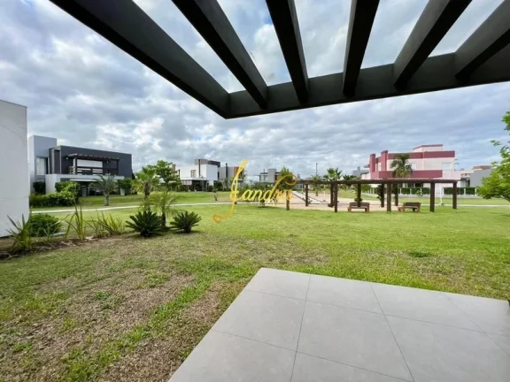 Imagem Excelente Casa no Condomínio Riviera Estilo contemporânea! Composta por 4 suítes, sendo 2 americanas,