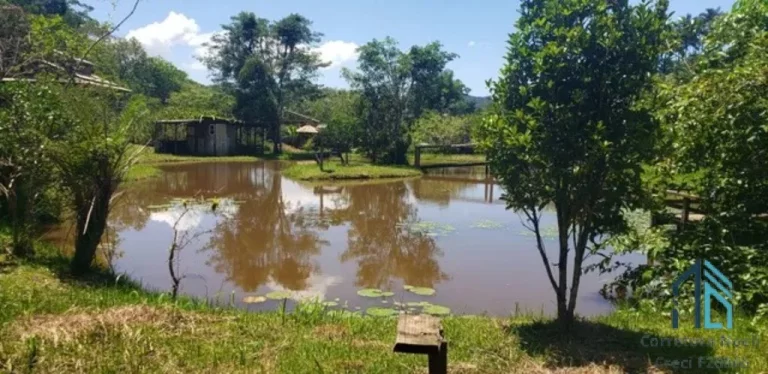 Imagem Sítio plana, 24.200 mil m², lagoa c/ peixes, área gourmet, fibra ótica, em ITAJAÍ SC
