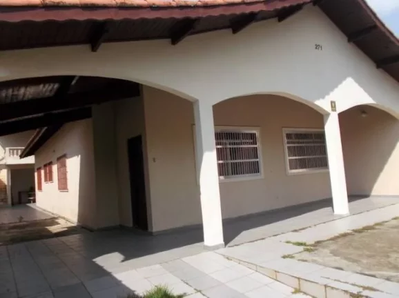Imagem casa lado praia- tres dormitorios