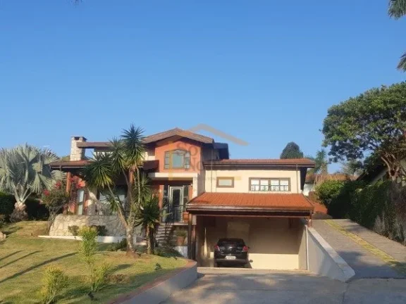 Imagem Casa em condomínio fechado, Imóvel térreo com desnível entre a área social e a área íntima, e...