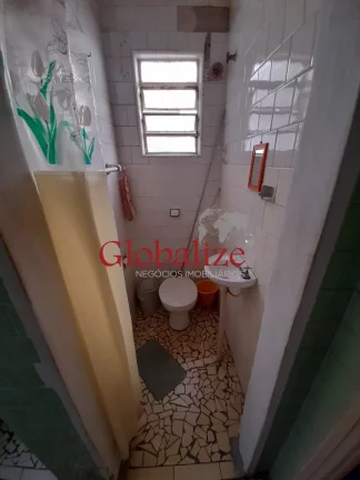 Imagem Casa com 3 dormitórios e 2 vagas à venda no Macuco em Santos R$ 900.000,00