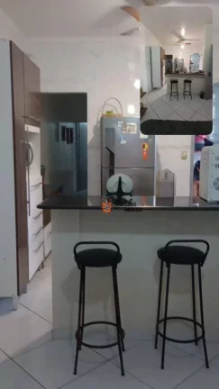 Imagem Casa com 2 dormitórios à venda, 64 m² por R$ 390.000 - Vila Caiçara - Praia Grande/SP