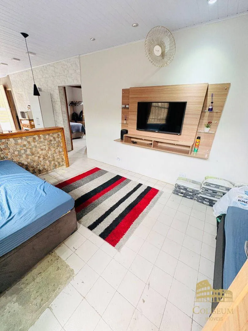 Imagem Casa com 3 dormitórios à venda por R$ 770.000,00 - Jardim Anhangüera - Praia Grande/SP