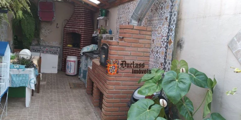 Imagem Casa com 3 dormitórios à venda, 135 m² por R$ 600.000 - Maracanã - Praia Grande/SP