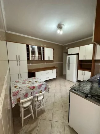 Imagem Sobrado com 3 dormitórios à venda, 147 m² por R$ 650.000 - Tupi - Praia Grande/SP