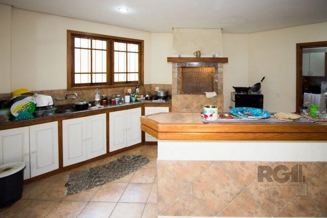 Imagem Sobrado com 6 suites, lareira, lavabo, pátio - Bairro Belém Velho