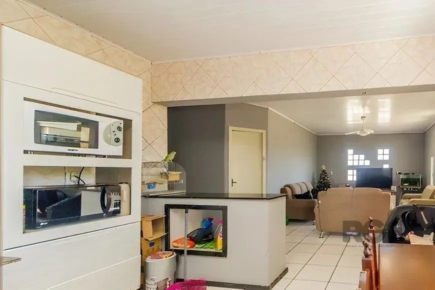 Imagem casa de 4 dormitórios, no bairro Lomba do Pinheiro