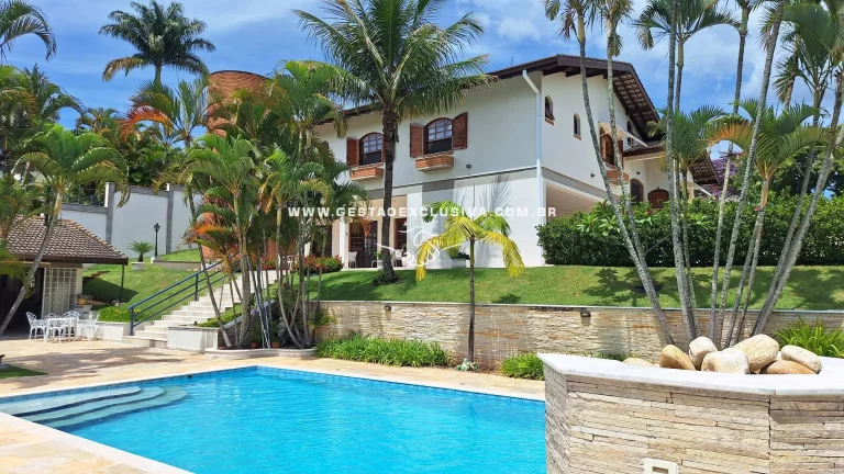 Imagem CASA LUXUOSA 4 SUÍTES PISCINA ÁREA GOURMET COMPLETA EM CONDOMÍNIO FECHADO