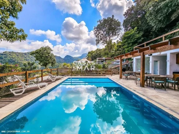 Foto do imóvel Casa de luxo à venda no Jardim Botânico, Rio de Janeiro - 5 quartos, 5 suítes, 8 banheiros, 2 vagas de garagem, 300,00 m².