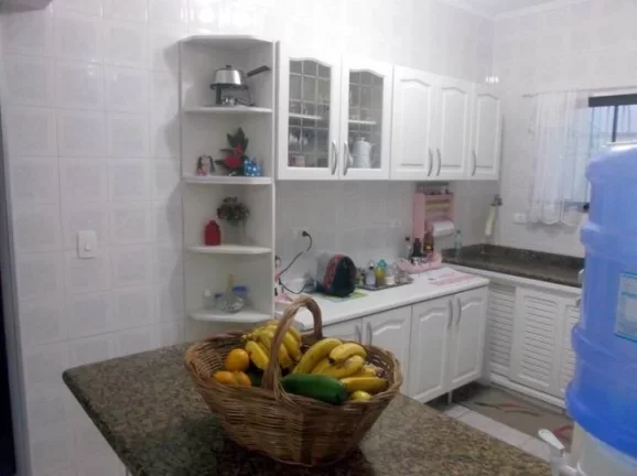Imagem CASA COM 4 DORMITORIOS (1 SUITES)