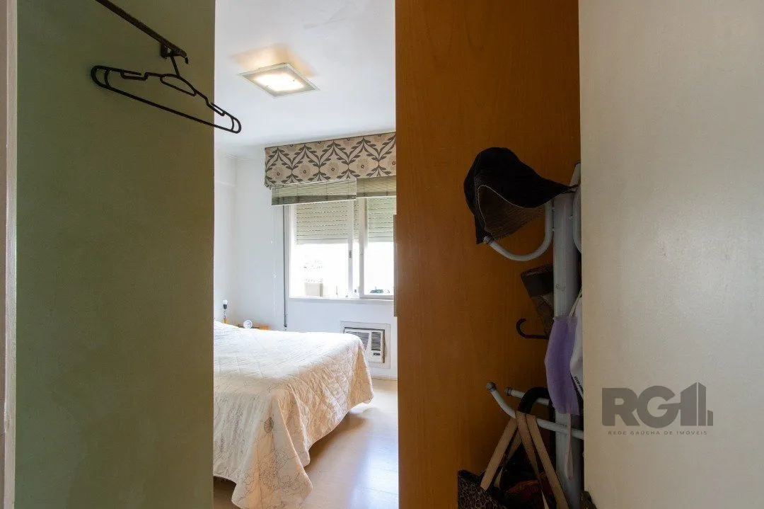 Imagem Apartamento com 73m², 2 dormitórios, área de serviço separada, living 2 ambientes , vaga de garagem escriturada e coberta.