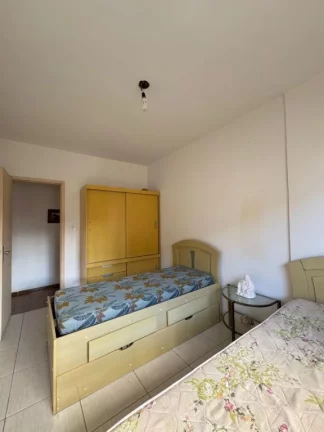 Imagem Apartamento 2 dormitórios, sala 2 ambientes, sacada, mobiliado, imóvel pronto para morar, no Bairro Tupi, Praia Grande, imóvel mobiliado à venda na Imobiliaria Consulte Imoveis.