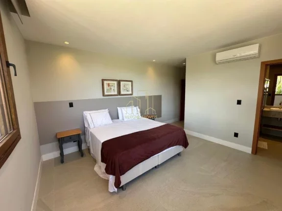 Imagem Com ambientes amplos e moderno essa casa decorada com quatro suítes e área gourmet a venda na Praia do Forte