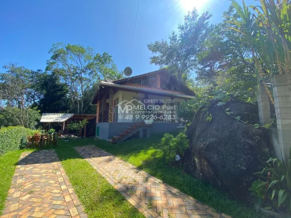 Imagem Sítio a VENDA, no Bairro Rolador, em Canelinha 10 Km, do centro. Nesse passa um ribeiro de cachoeira nos fundos da casa Tendo uma casa de 2 dormitóri