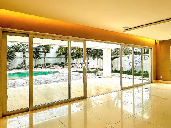 Imagem Paraíso em Malibu: Uma Residência Excepcional na Barra da Tijuca, Rio de Janeiro-RJ: 4 suítes, 3 vagas, 1.000 m² de área.