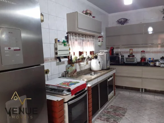 Imagem Sobrado com 4 dormitórios à venda, 292 m² por R$ 940.000,00 - Parque Oratório - Santo André/SP