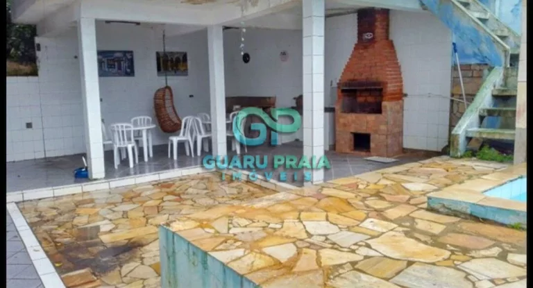 Imagem Casa com 6 quartos sendo 4 suítes, sala de jantar, sala de estar, sala de TV, 5 banheiros, cozinha armário planejado, lavanderia, churrasqueira, piscina, lindo jardim arborizado