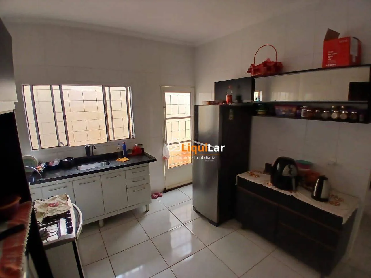 Imagem Casa à Venda Próxima à Avenida Lúdio Martins Coelho com Suíte, Energia Fotovoltaica e Acabamento de Primeira