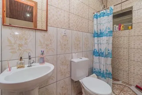 Imagem Casa 2 dorms à venda Avenida Outeiro, Coronel Aparício Borges - Porto Alegre